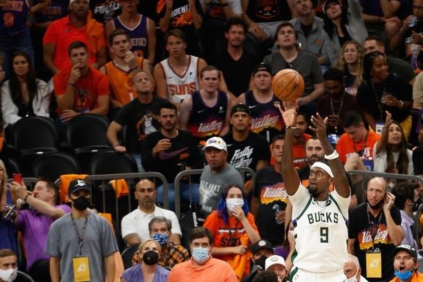 Bobby Portis of the Milwaukee Bucks attempts a shot against the Phoenix Suns in the second half of game five of the NBA Finals at Footprint Center on...