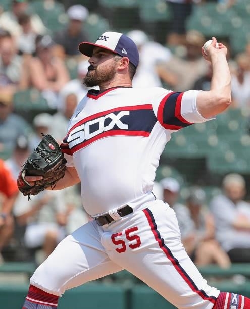 Starting pitcher Carlos Rodon of the Chicago White Sox delivers the ball against the Houston Astros at Guaranteed Rate Field on July 18, 2021 in...
