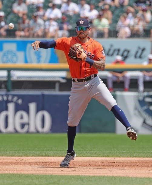 Carlos Correa of the Houston Astros throws out a Chicago White Sox runner in the 2nd inning at Guaranteed Rate Field on July 18, 2021 in Chicago,...