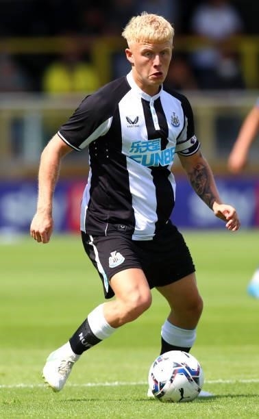Jack Young of Newcastle United controls the ball during the Pre-Season Friendly between Harrogate Town vs Newcastle United on July 18, 2021 in...