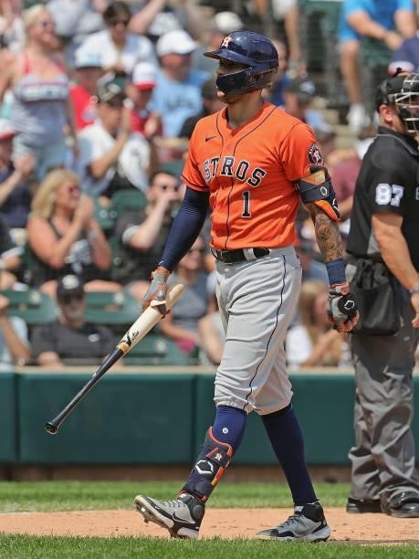 Carlos Correa of the Houston Astros walks to the dugout after striking out in the 5th inning against the Chicago White Sox at Guaranteed Rate Field...