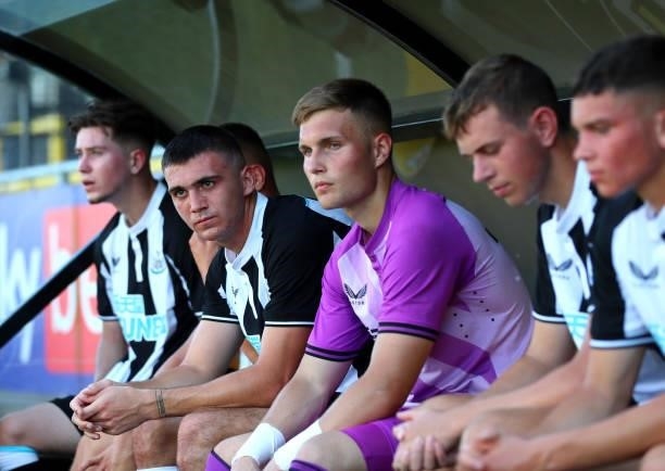 Oisin Mcentee and Will Brown of Newcastle United sit on the bench after the Pre-Season Friendly between Harrogate Town vs Newcastle United on July...