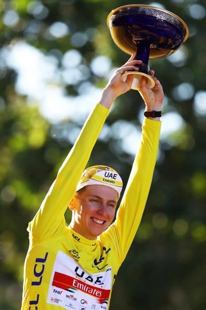 Tadej Pogačar of Slovenia and UAE-Team Emirates Yellow Leader Jersey celebrates at podium during the 108th Tour de France 2021, Stage 21 a 108,4km...