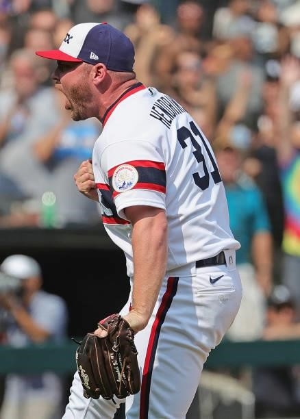 Liam Hendriks of the Chicago White Sox reacts after finishing off the Houston Astros in the 9th inning at Guaranteed Rate Field on July 18, 2021 in...