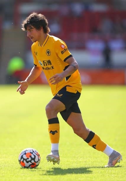 Hugo Bueno of Wolverhampton Wanderers runs with the ball during the Pre-Season friendly match between Crewe Alexandra and Wolverhampton Wanderers at...