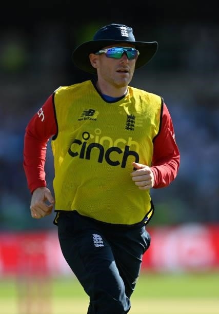 England captain Eoin Morgan acts as 12th man during the Second Vitality International T20 match between England and Pakistan at Emerald Headingley...