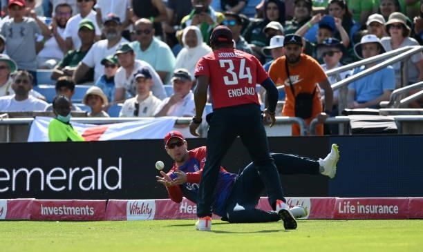 Liam Livingstone of England fields the ball with Chris Jordan during the Second Vitality International T20 match between England and Pakistan at...