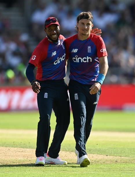 Tom Curran of England celebrates with Chris Jordan after dismissing Imad Wasim of Pakistan during the Second Vitality International T20 match between...