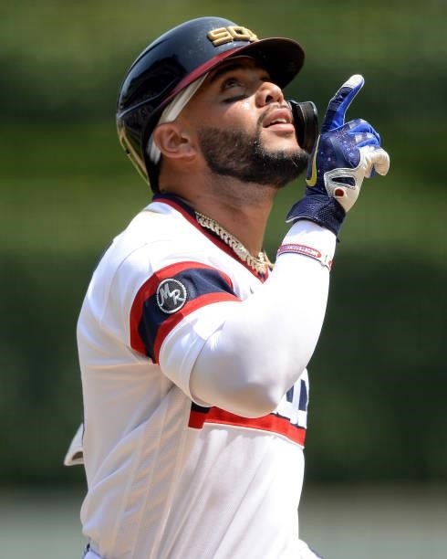 Yoan Moncada of the Chicago White Sox reacts after hitting a home run in the fourth inning against the Houston Astros on July 18, 2021 at Guaranteed...