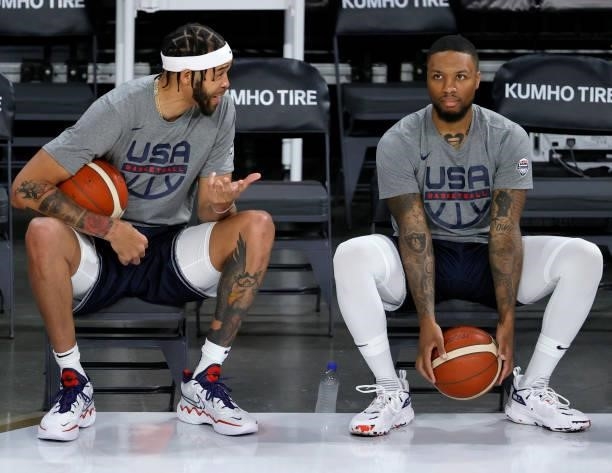 JaVale McGee and Damian Lillard of the United States talk during warmups before an exhibition game against Spain at Michelob ULTRA Arena ahead of the...