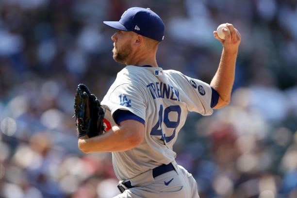Pitcher Blake Treinen of the Los Angeles Dodgers throws against the Colorado Rockies in the eighth inning at Coors Field on July 18, 2021 in Denver,...