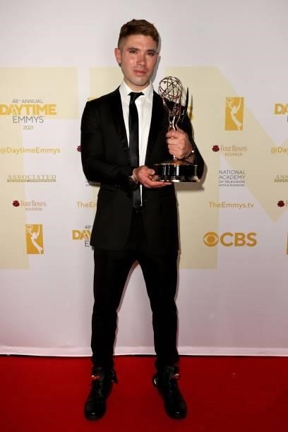 Kristos Andrews poses with the award for Outstanding Performance by a Lead Actor in a Daytime Fiction Program for "The Bay