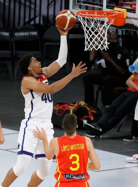 Keldon Johnson of the United States scores against Xabi Lopez of Spain during an exhibition game at Michelob ULTRA Arena ahead of the Tokyo Olympic...