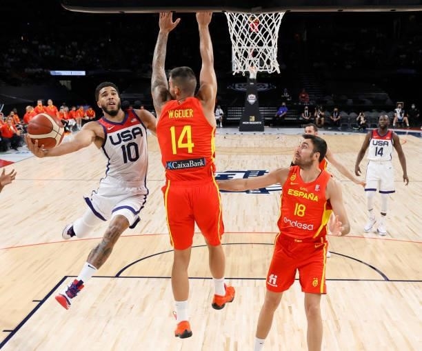 Jayson Tatum of the United States shoots against Willy Hernangomez and Pierre Oriola of Spain during an exhibition game at Michelob ULTRA Arena ahead...