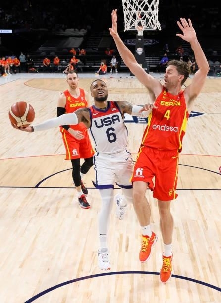 Damian Lillard of the United States shoots against Pau Gasol of Spain during an exhibition game at Michelob ULTRA Arena ahead of the Tokyo Olympic...