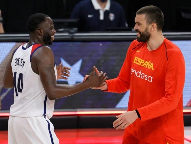 Draymond Green of the United States and Marc Gasol of Spain shake hands after an exhibition game at Michelob ULTRA Arena ahead of the Tokyo Olympic...