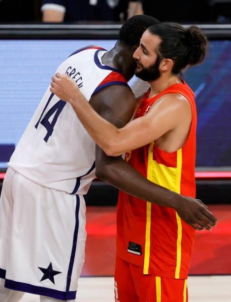 Draymond Green of the United States and Ricky Rubio of Spain greet each other after an exhibition game at Michelob ULTRA Arena ahead of the Tokyo...