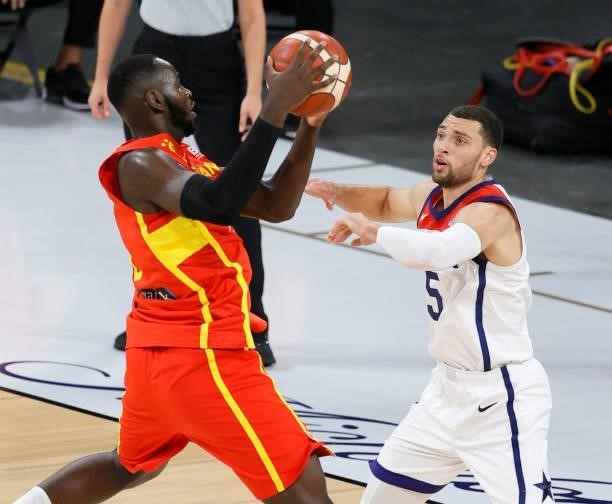 Usman Garuba of Spain catches a pass under pressure from Zach LaVine of the United States during an exhibition game at Michelob ULTRA Arena ahead of...