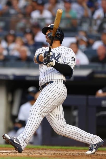 Gleyber Torres of the New York Yankees hits a home run against the Boston Red Sox during the second inning of a game at Yankee Stadium on July 18,...