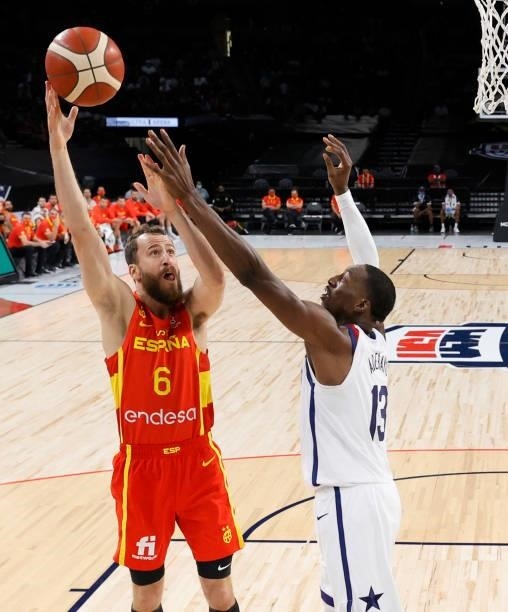 Sergio Rodriguez of Spain shoots against Bam Adebayo of the United States during an exhibition game at Michelob ULTRA Arena ahead of the Tokyo...