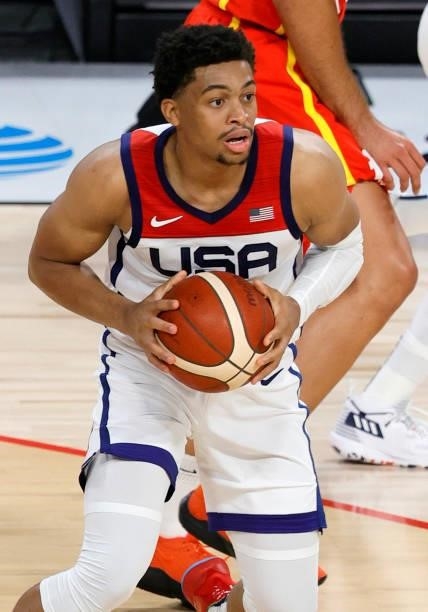Keldon Johnson of the United States grabs a loose ball against Spain during an exhibition game at Michelob ULTRA Arena ahead of the Tokyo Olympic...