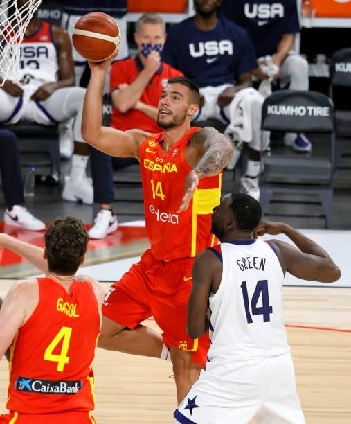 Willy Hernangomez of Spain shoots against Draymond Green of the United States during an exhibition game at Michelob ULTRA Arena ahead of the Tokyo...