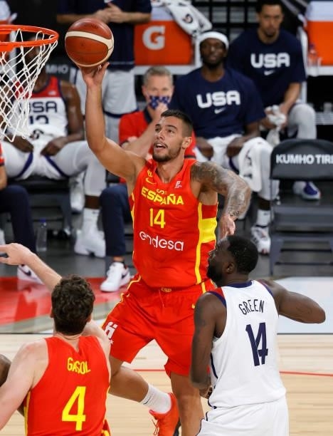 Willy Hernangomez of Spain shoots against Draymond Green of the United States during an exhibition game at Michelob ULTRA Arena ahead of the Tokyo...