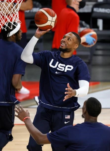 Damian Lillard of the United States warms up before an exhibition game against Spain at Michelob ULTRA Arena ahead of the Tokyo Olympic Games on July...