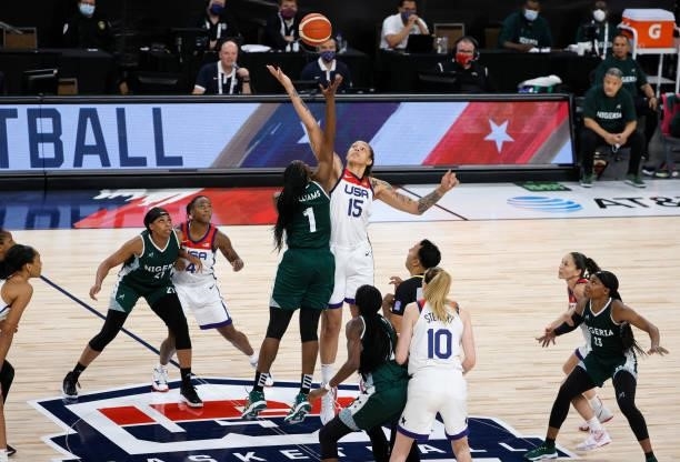 Elizabeth Williams of Nigeria and Brittney Griner of the United States vie for the tipoff during an exhibition game at Michelob ULTRA Arena ahead of...