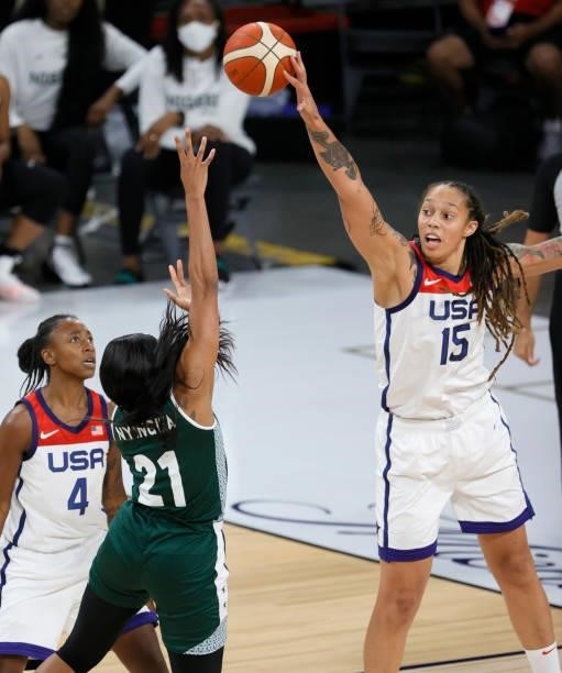 Brittney Griner of the United States blocks a shot by Atonye Nyingifa of Nigeria as Jewell Loyd of the United States defends during an exhibition...