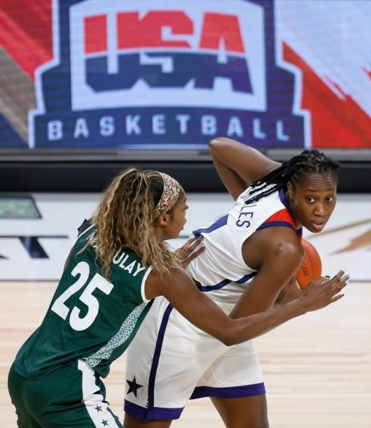 Tina Charles of the United States is guarded by Victoria Macaulay of Nigeria during an exhibition game at Michelob ULTRA Arena ahead of the Tokyo...