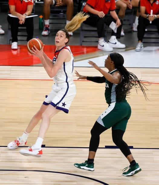 Breanna Stewart of the United States catches a pass against Ezinne Kalu of Nigeria during an exhibition game at Michelob ULTRA Arena ahead of the...
