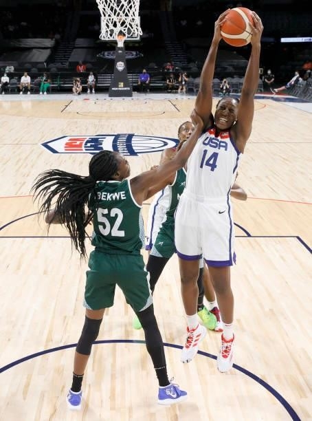 Tina Charles of the United States grabs a rebound against Ify Ibekwe of Nigeria during an exhibition game at Michelob ULTRA Arena ahead of the Tokyo...