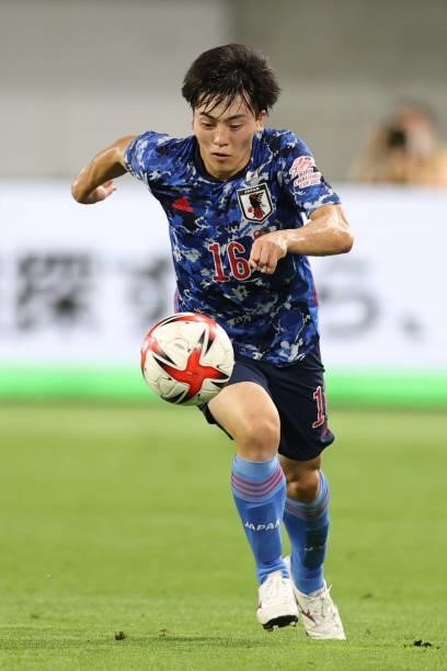 Yuki Soma of Japan in action during the U-24 international friendly match between Japan and Spain at the Noevir Stadium Kobe on July 17, 2021 in...