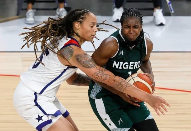 Elizabeth Williams of Nigeria is guarded by Brittney Griner of the United States during an exhibition game at Michelob ULTRA Arena ahead of the Tokyo...