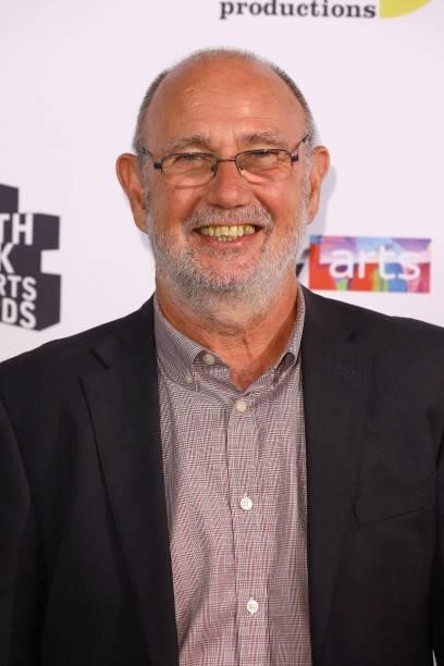 Jimmy McGovern presents Samuel Bailey The Times Breakthrough Award at The South Bank Sky Arts Awards at The Savoy on July 19, 2021 in London,...