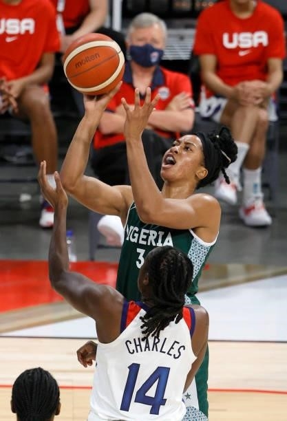 Pallas Kunaiyi-Akpanah of Nigeria shoots against Tina Charles of the United States during an exhibition game at Michelob ULTRA Arena ahead of the...