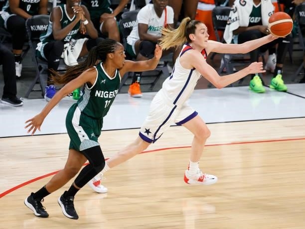Breanna Stewart of the United States catches a pass ahead of Adaora Elonu of Nigeria during an exhibition game at Michelob ULTRA Arena ahead of the...
