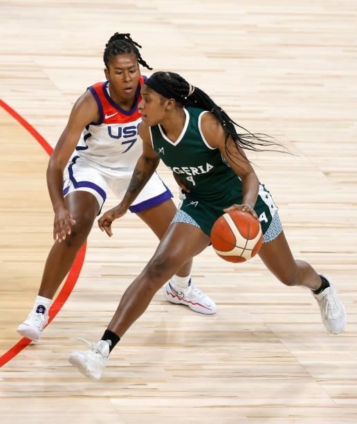 Elizabeth Balogun of Nigeria drives against Ariel Atkins of the United States during an exhibition game at Michelob ULTRA Arena ahead of the Tokyo...