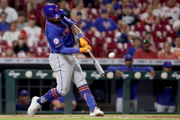 Kevin Pillar of the New York Mets hits a home run in the eleventh inning against the Cincinnati Reds at Great American Ball Park on July 19, 2021 in...