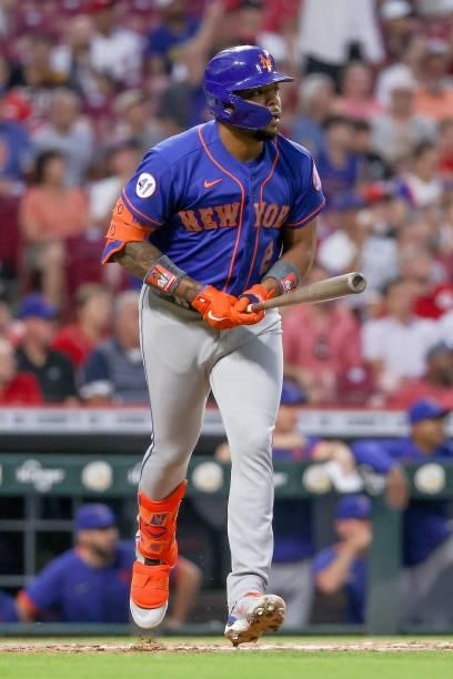 Dominic Smith of the New York Mets rounds the bases after hitting a home run in the fifth inning against the Cincinnati Reds at Great American Ball...