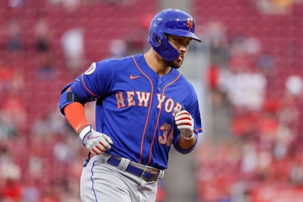 Michael Conforto of the New York Mets rounds the bases after hitting a home run in the fourth inning against the Cincinnati Reds at Great American...