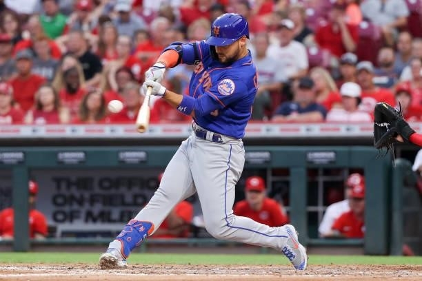 Michael Conforto of the New York Mets hits a home run in the fourth inning against the Cincinnati Reds at Great American Ball Park on July 19, 2021...