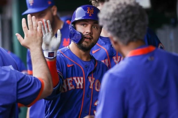 Michael Conforto of the New York Mets celebrates with teammates after hitting a home run in the fourth inning against the Cincinnati Reds at Great...