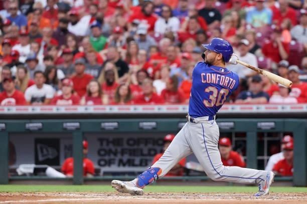 Michael Conforto of the New York Mets hits a home run in the fourth inning against the Cincinnati Reds at Great American Ball Park on July 19, 2021...