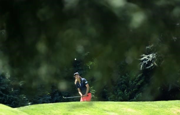 Celine Herbin of France plays a shot during previews ahead of the The Amundi Evian Championship at Evian Resort Golf Club on July 20, 2021 in...