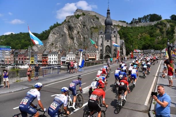 The Peloton passing through a bridge in front of The Collegiate Church of Our Lady at Dinant City during the 42nd Tour de Wallonie 2021, Stage 1 a...