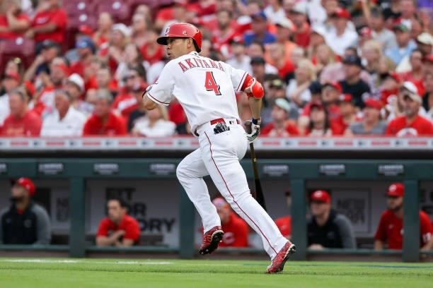 Shogo Akiyama of the Cincinnati Reds hits a sacrifice fly in the first inning against the New York Mets at Great American Ball Park on July 19, 2021...