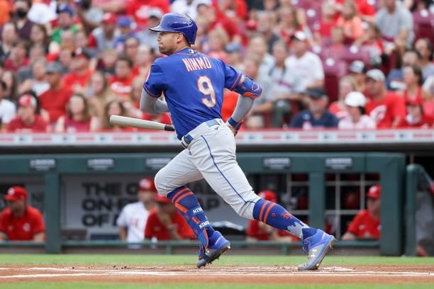 Brandon Nimmo of the New York Mets hits a single in the first inning against the Cincinnati Reds at Great American Ball Park on July 19, 2021 in...