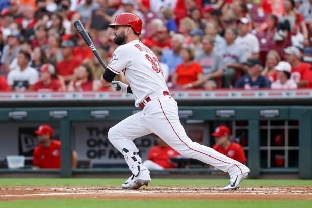 Jesse Winker of the Cincinnati Reds hits a single in the first inning against the New York Mets at Great American Ball Park on July 19, 2021 in...